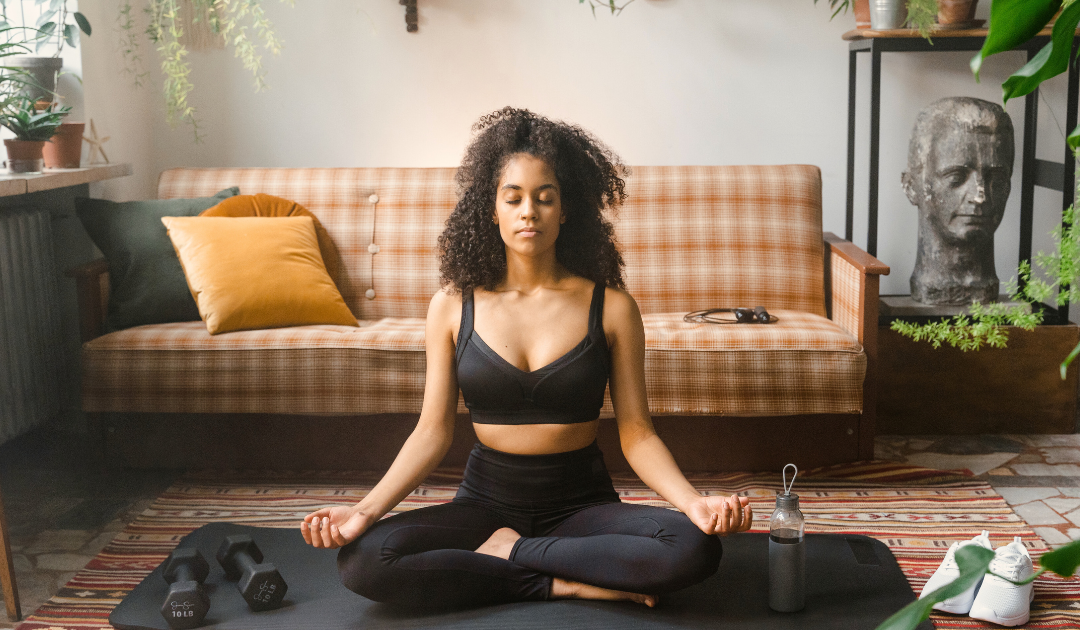 a girl meditating at home