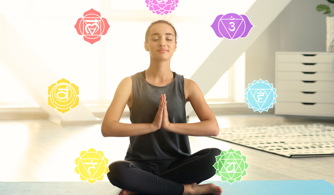 a girl sitting with hands folded and meditating