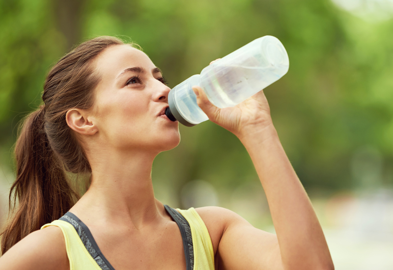 a woman drinking water