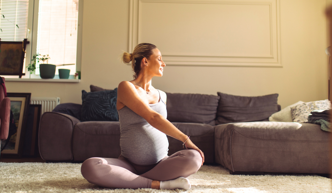 a pregnant woman doing yoga