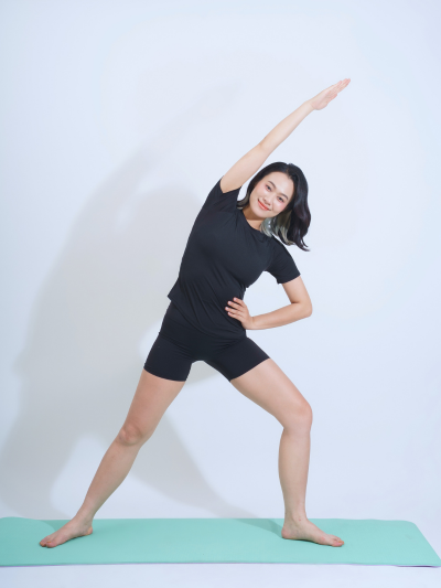 Person stretching on yoga mat
